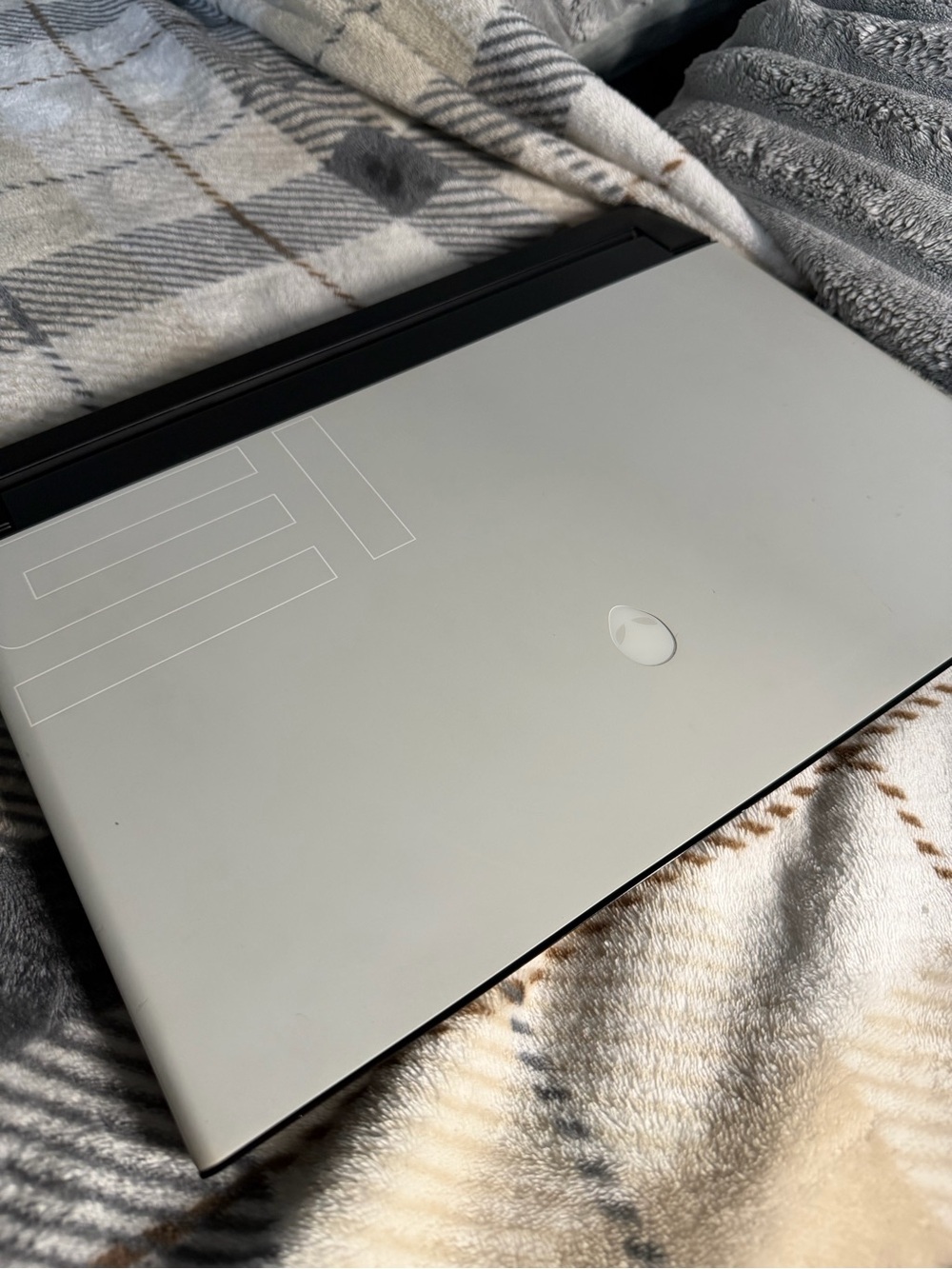 Alienware Silver-Gray Gaming Laptop with Subtle Logo